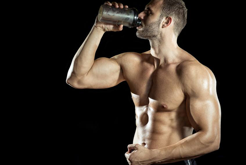 man-drinking-pre-workout